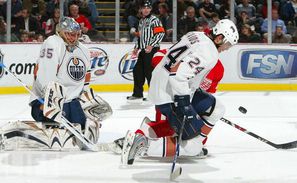 Steve Staios in action as an Edmonton Oiler, doing what he does best: taking pain blocking a shot