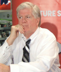 Brian Burke taking questions at a press conference