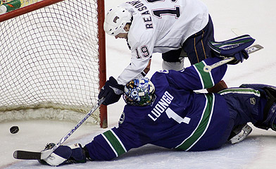 He shoots he scores! Marty Reasoner as an Oiler on Roberto Luongo